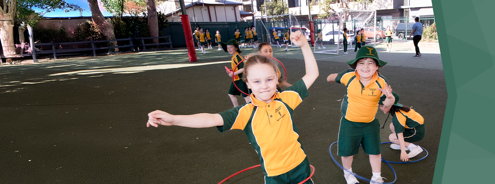 St Patrick's Catholic Primary Parramatta students hoola hooping on the playground