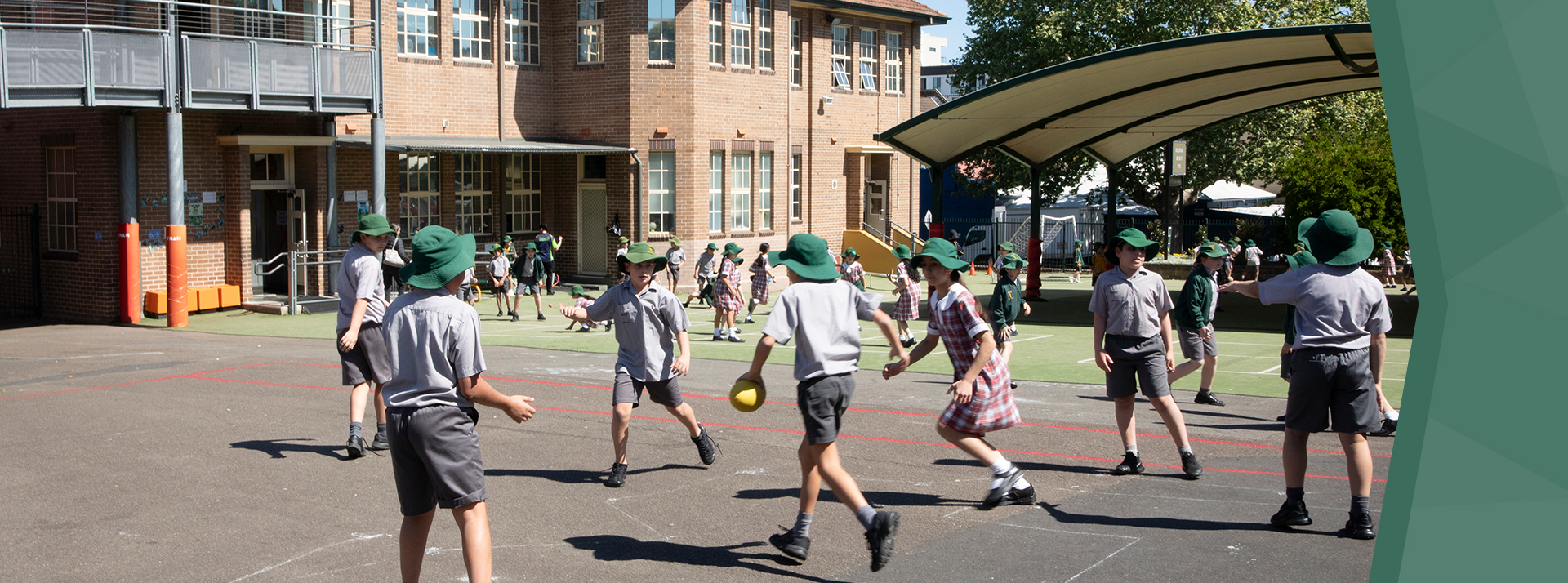 St Patrick's Catholic Primary School Parramatta students running on school playground