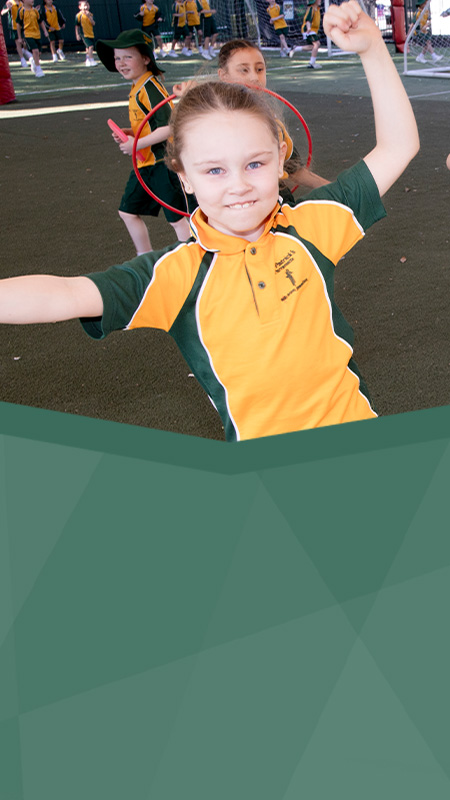 St Patrick's Catholic Primary Parramatta students hoola hooping on the playground