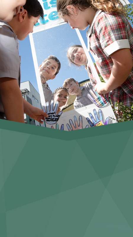 St Patrick's Catholic Primary School Parramatta students looking into mirror