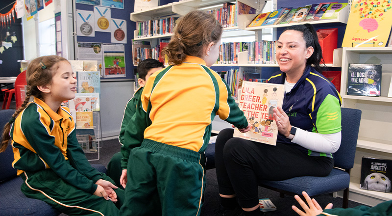 St Patrick's Catholic Primary School Parramatta students reading with dedicated teachers