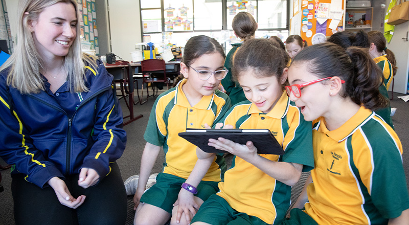 St Patrick's Catholic Primary School Parramatta students and dedicated teacher play with B Balls