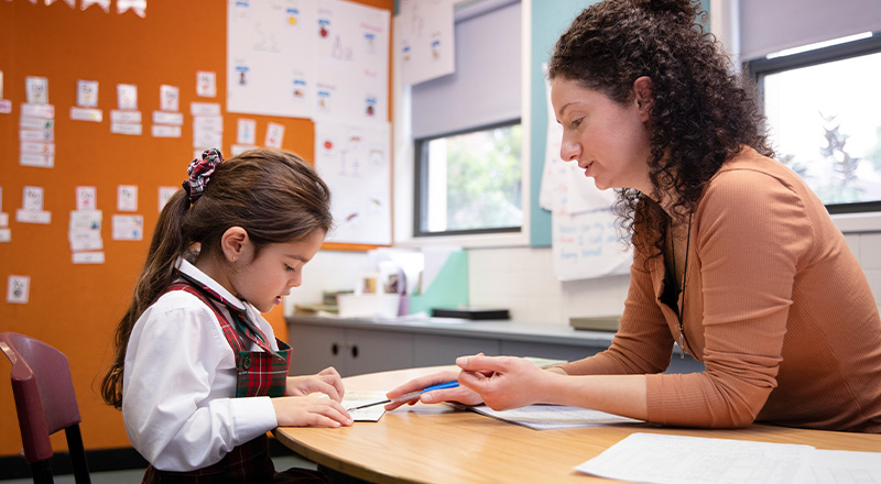 St Patrick's Catholic Primary School Parramatta student learning with dedicated teacher