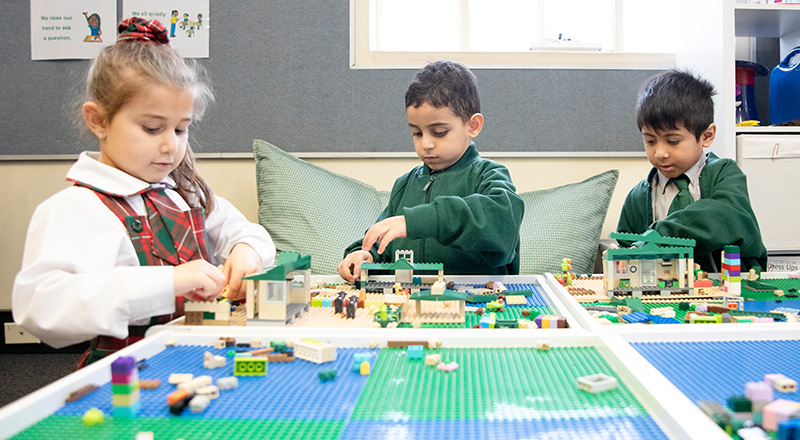 St Patrick's Catholic Primary School Parramatta students playing on LEGO table top