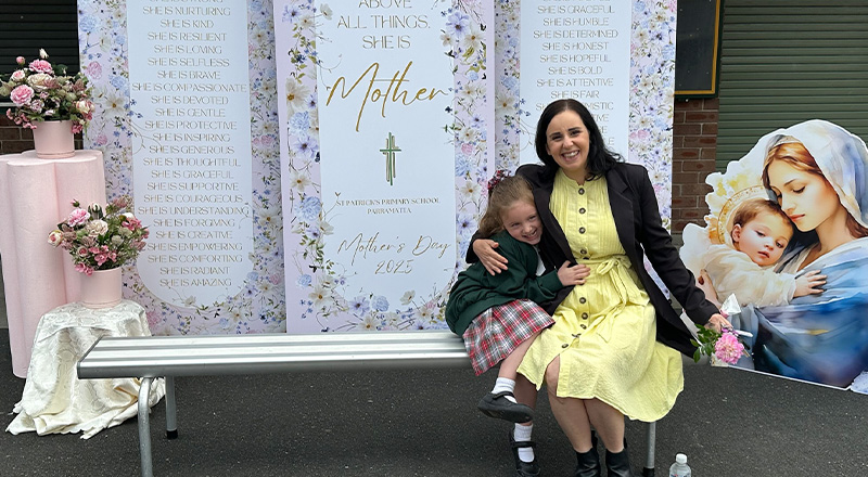 St Patrick's Catholic Primary School Parramatta mother sits with joyous children