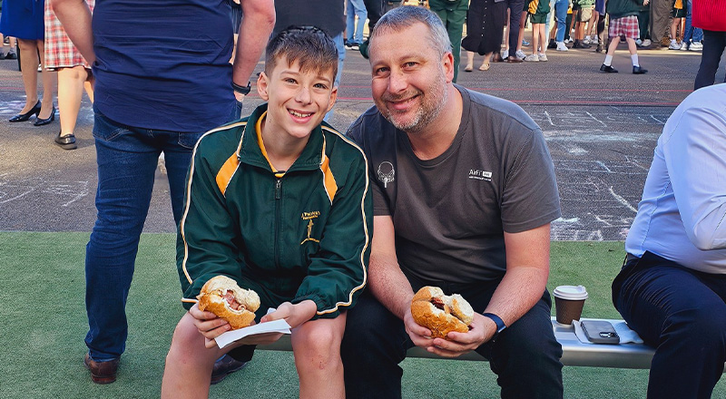 St Patrick's Catholic Primary School Parramatta student sitting with supportive father