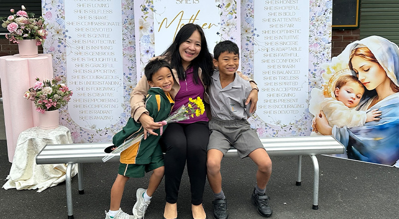 St Patrick's Catholic Primary School Parramatta mother sits with joyous children