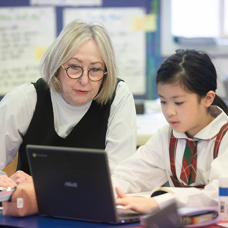St Patrick's Catholic Primary School Parramatta students learning with dedicated teacher