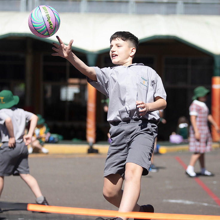St Patrick's Catholic Primary School Parramatta student playing volleyball