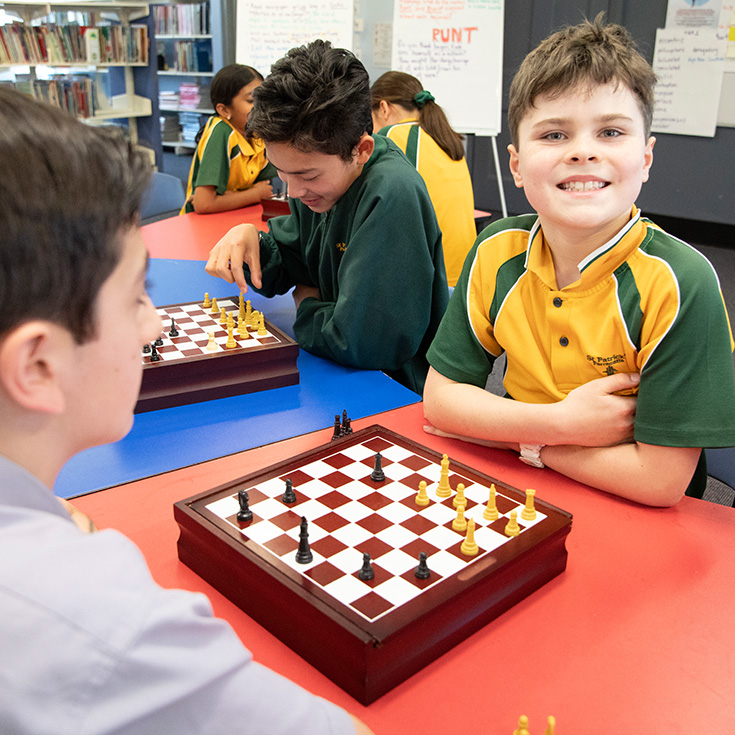 St Patrick's Catholic Primary School Parramatta students playing chess in school library